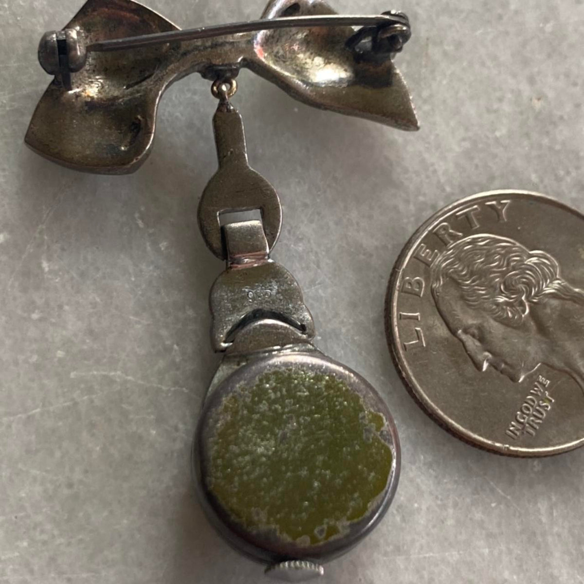 1930s lapel watch pin with bow and rhinestones