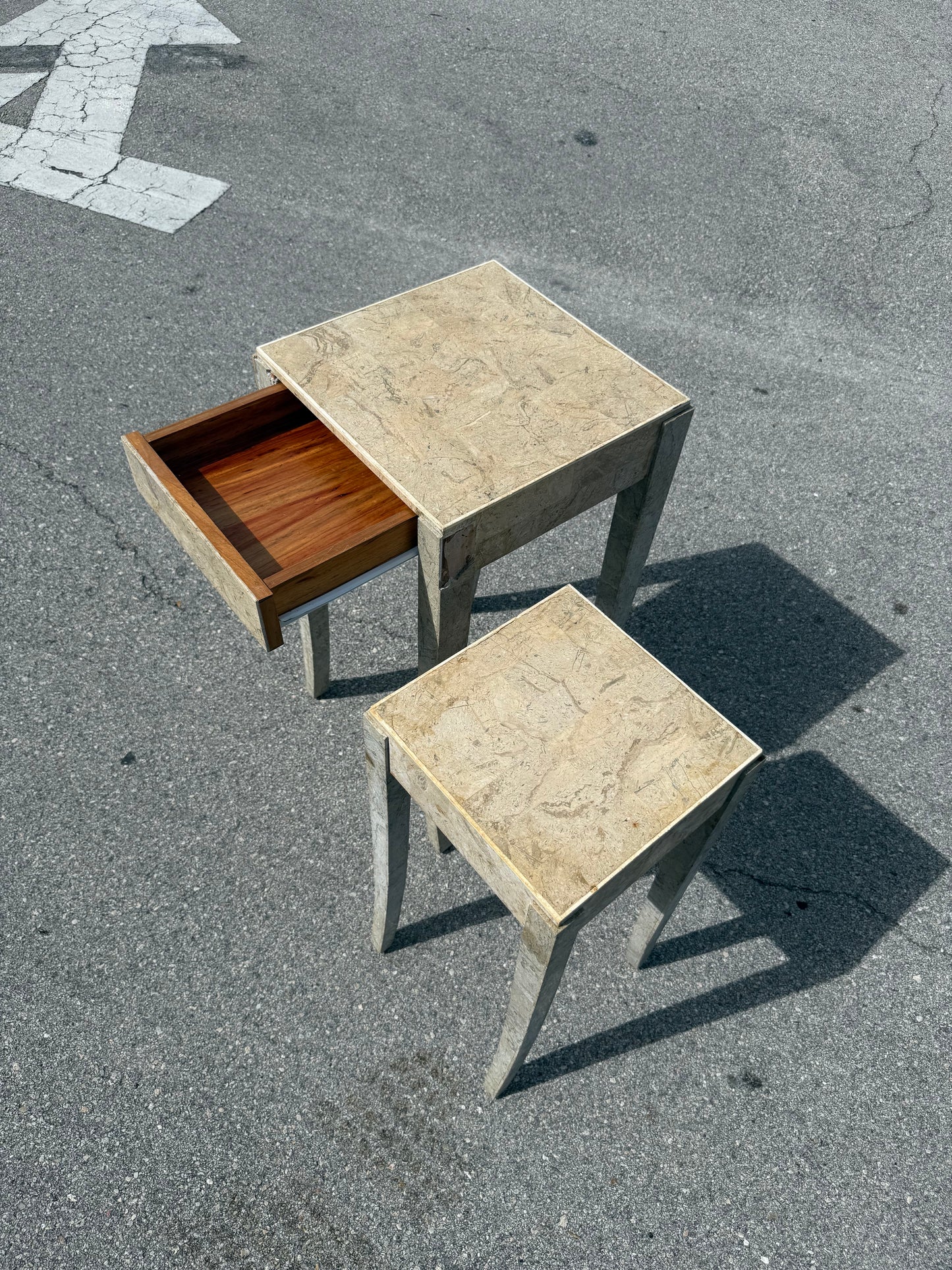Midcentury Modern pair of travertine marble cloaked nesting side tables