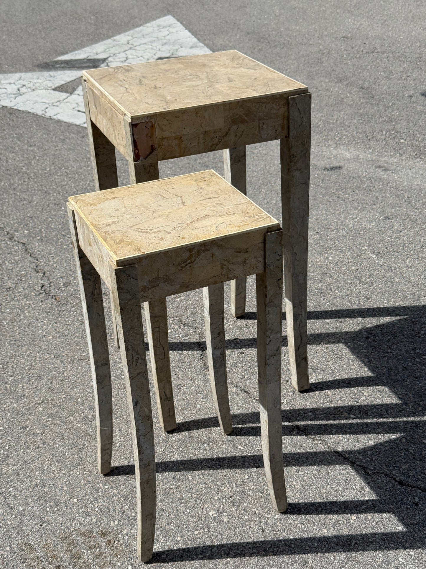 Midcentury Modern pair of travertine marble cloaked nesting side tables