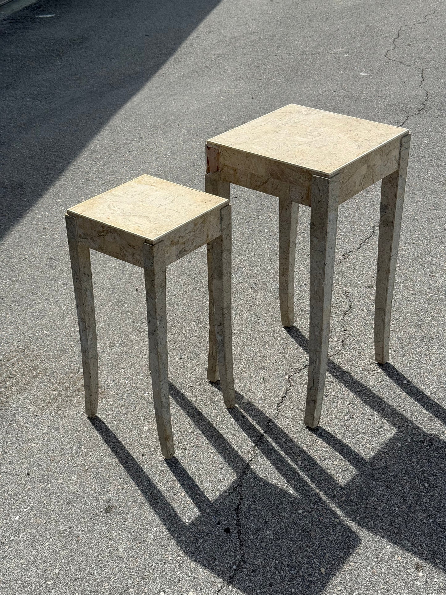 Midcentury Modern pair of travertine marble cloaked nesting side tables
