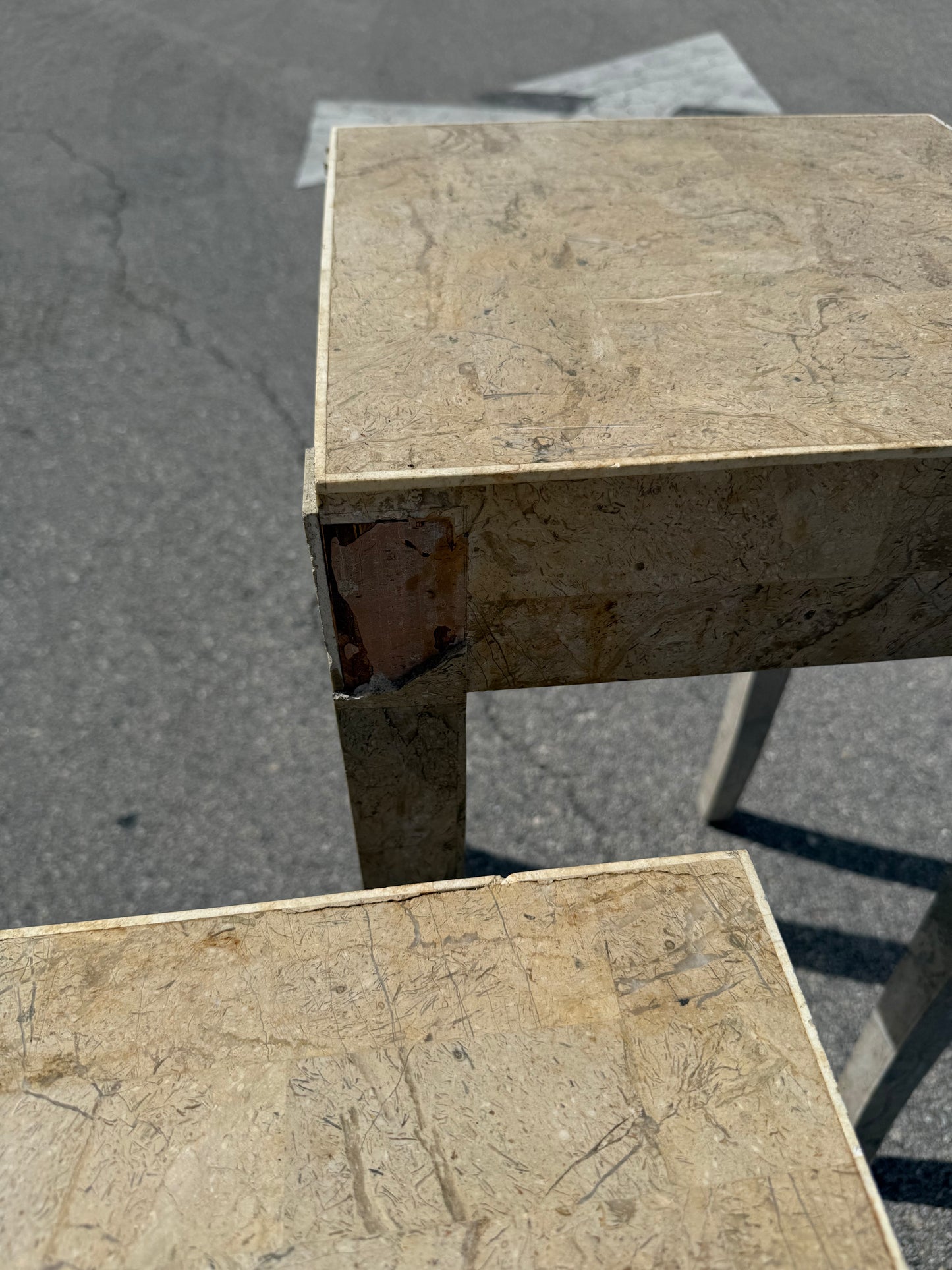 Midcentury Modern pair of travertine marble cloaked nesting side tables