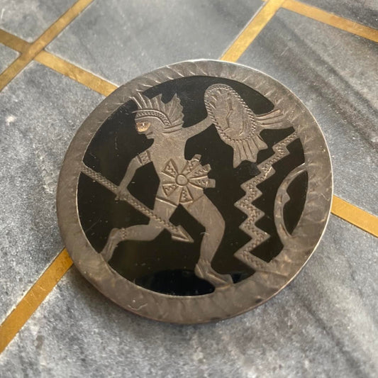 mexican silver pin with warrior and zigzags