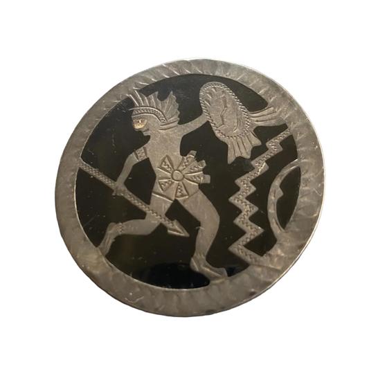 mexican silver pin with warrior and zigzags