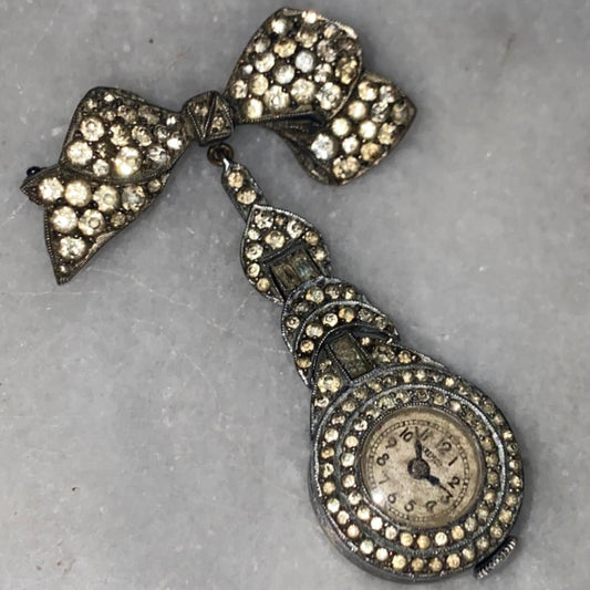 1930s lapel watch pin with bow and rhinestones